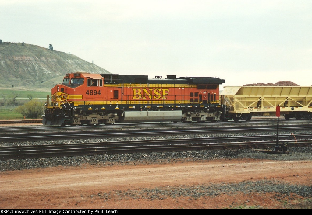 Tied down ballast train